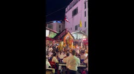 Classical orchestra plays outside shrine in Bangkok