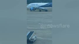 Plane engine catches fire on runway in Indonesia