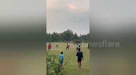 Wild elephant joins in game of football with youngsters in India