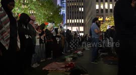 US: Pro-Palestinian protesters pray before start of the rally