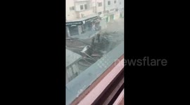 Gaza: An Israeli military bulldozer destroys infrastructure during a raid into the city of Jenin