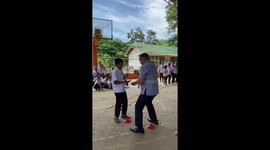 School children erupt with joy playing rock, paper, scissors... with a twist