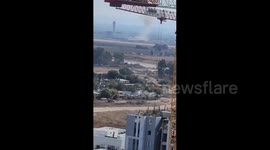 Israel: Smoke is seen rising after a rocket fired from Lebanon hit close to Ben-Gurion Airport in Tel Aviv