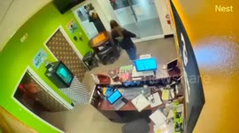 CCTV shows teen employee shelter shoppers during shooting