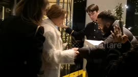 Jennifer Lopez gets a big suprise from fans who shower her with gifts as she returns to her hotel in London