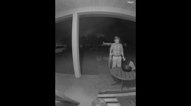 Trick-or-Treating Boy Refills Empty Candy Bowl