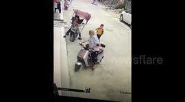 Young Boy Falls Head-First Off Electric Scooter, but Grandpa Reacts in Time to Pull Him Back