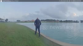 Police officers rescue three dogs stranded in pond
