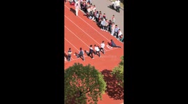 Boy accidentally knocks down classmate during sprint race in Jiangsu province, China