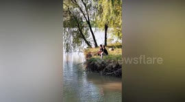 Terrified anglers flee powerful tidal river wave