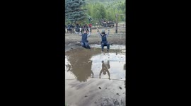 Boys play survival game, tackle attempt fails into mud