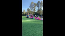 Participants collide during a game of duck-duck-goose in Vancouver