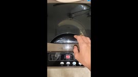 Washing machine lid opens to reveal pet goldfish and turtle living inside