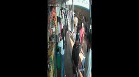 Commuter slips onto train tracks while trying to board moving carriage