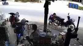 Out-of-control motorcycle crashes through repair shop