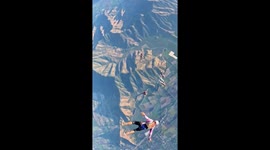 Skydiving team's epic aerial formation brings head-down thrills in high-speed freefall