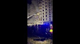 Russian attack destroys building in Kharkiv