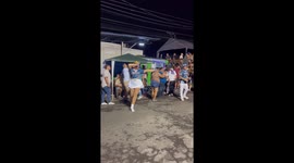 Drum major accidentally hits spectator during parade performance