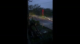 Typhoon Yinxing blows trees and power lines in the Philippines