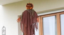 Halloween pumpkin head scarecrow suspended to the ceiling. Paris suburb, France, Yvelines, Bois d'Arcy, Versailles Grand Parc..4 November 2024