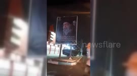 Iran: Iranian Protestors set fire on Khamini billboard in Tehran