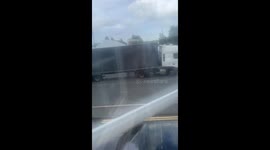 Confrontation erupts as sedan driver climbs truck to fight driver in Slough