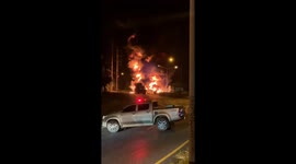 Exclusive- Tragic collision sparks fire as truck hits bus, leaving driver fatally trapped