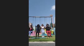 Swing collapses as friends playfully ride it, causing laughter