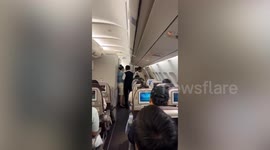 Passenger sparks panic by trying to open door on flight to South Korea