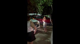 Woman sparks outrage by standing in parking space to reserve spot