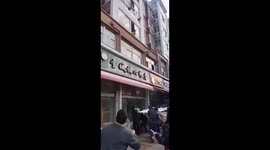 Neighbours save toddler wandering along window ledge in China