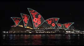 Sydney Opera House illuminated with poppies for Remembrance Day, Sydney, Australia