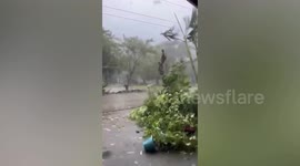 Heavy rain lashes homes as Typhoon Toraji makes landfall in the Philippines