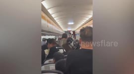 Woman 'attacks air hostess' on flight in China