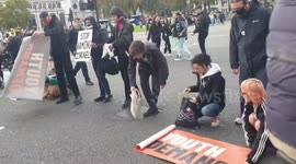 UK: Supporters of Youth Demand silently shut the road into Parliament Square at exactly 11am this morning, during the Armistice service at the Cenotaph
