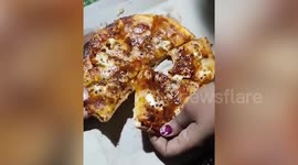 Live WORMS found in pizza from restaurant in India