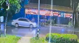 Furious wife holds onto husband car's bonnet 'after finding him cheating on her with another woman'