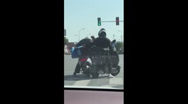 Delivery rider helps another with faulty box but drops his own bike