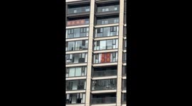 Residents stick notes on windows for warning 'do not buy, run away!'