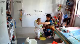 Toddler gets head stuck in toilet seat, but quick-thinking grandma calmly saves the day