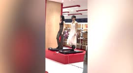 Chinese shop uses real women on treadmills instead of clothes mannequins