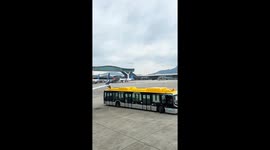 Shuttle bus hits plane's wing tip at Hong Kong airport