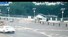 Out-of-control minibus falls off bridge