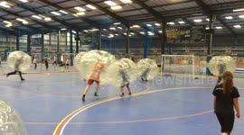 Lads knock the hell out of each other playing zorb football on stag do