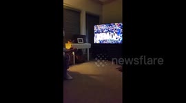 Man celebrates after watching NBA team win title