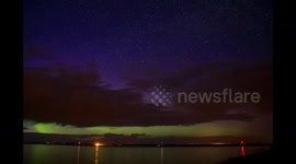 Aurora Borealis and storm over Lake Winnipeg