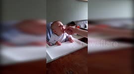 Hilarious: father and 7 month old baby making funny noises together