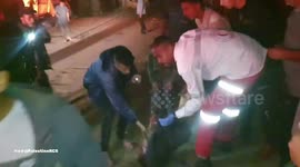 Palestine Red Crescent teams are retrieving the body of an individual and aiding 16 injured individuals