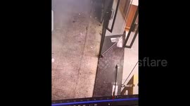 The moment the customer opened the door, a mouse tried to pass through and got stuck in the door gap