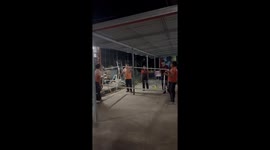 Teachers try to make football goal but end up stuck on pole